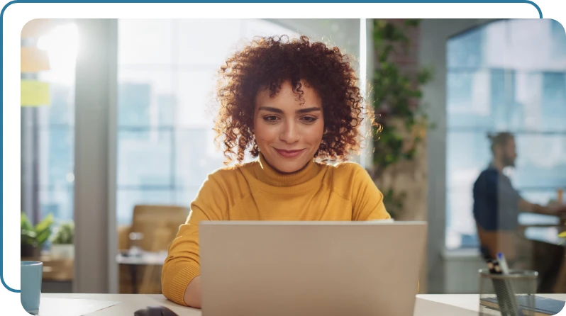 young business woman working at her laptop computer